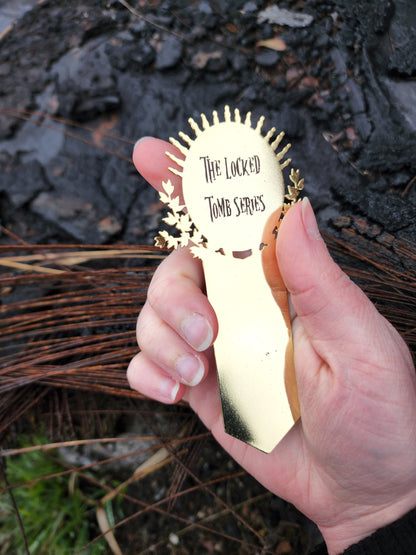 The Locked Tomb - John's Joke Enamel Bookmark